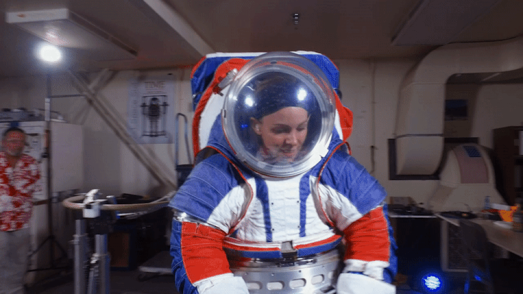 Astronaut testing out space suit.