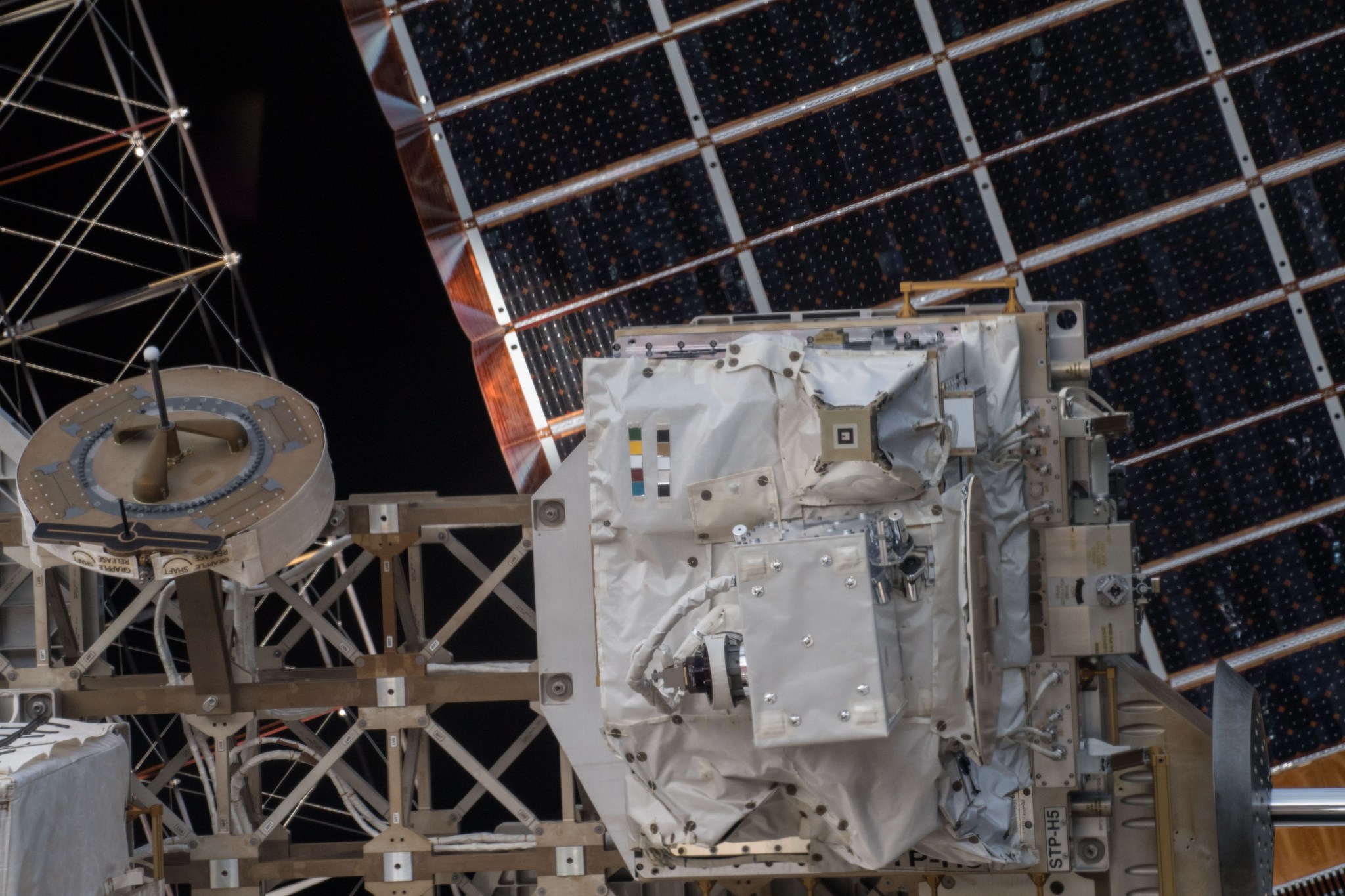 View of material strips used for the Space Test Program, which exposes different paints and coatings to the space environment.