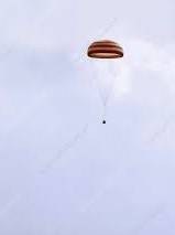 astp_soyuz_landing_capsule_on_parachute