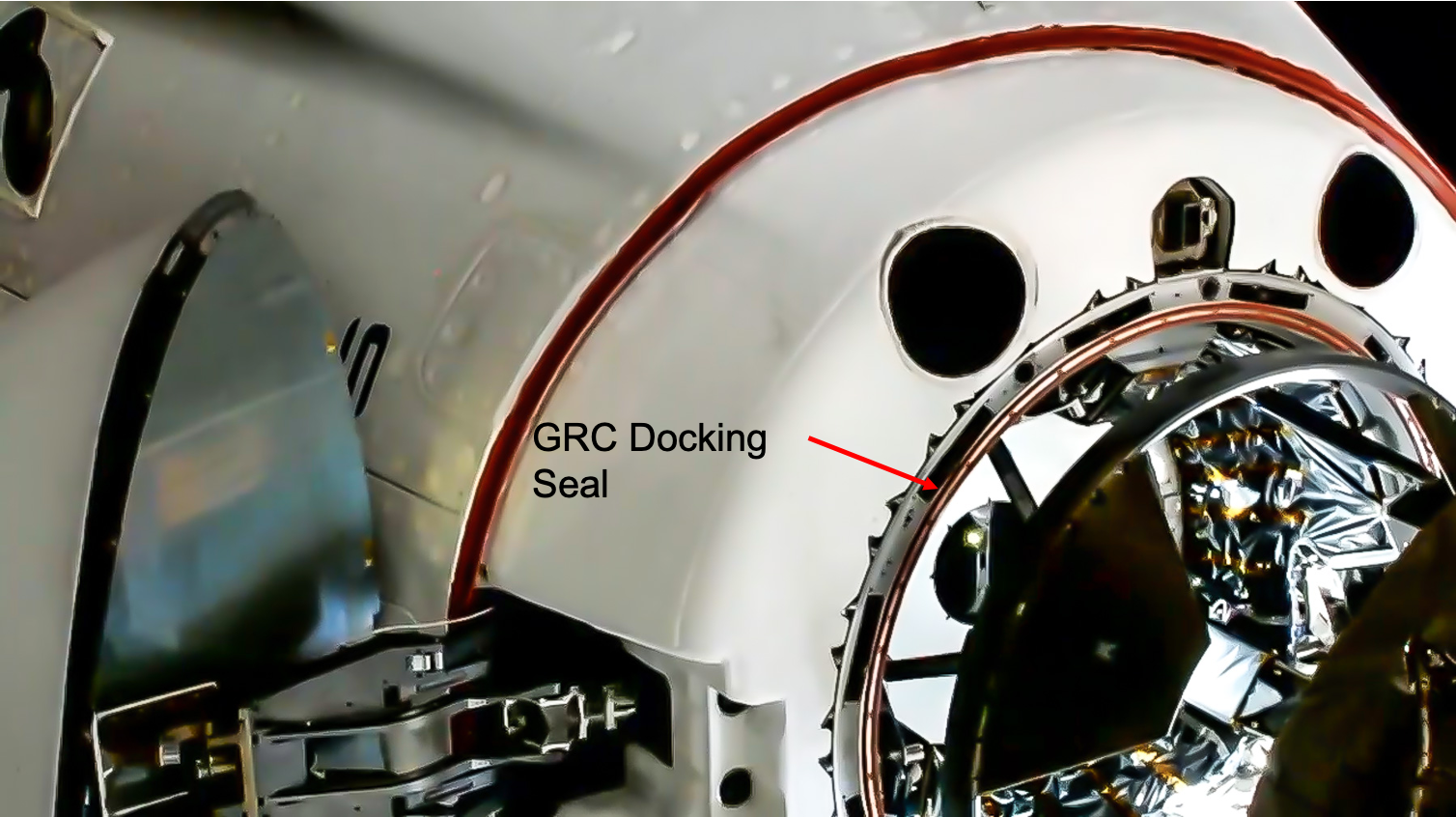 The Crew Dragon spacecraft with its nose cone open.