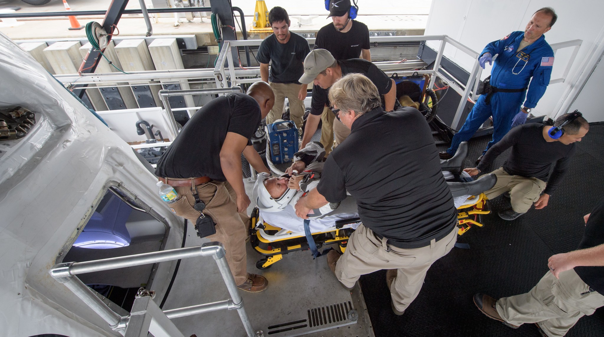 NASA astronaut Doug Hurley, along with teams from NASA and SpaceX, rehearse crew extraction from SpaceX’s Crew Dragon