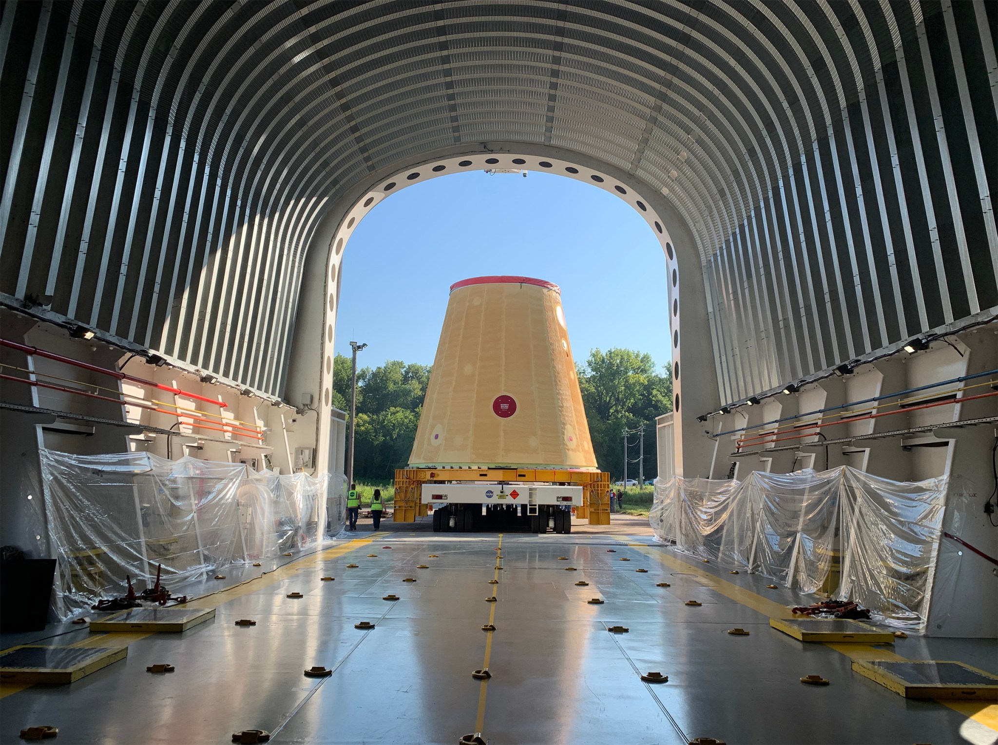 Space Launch System (SLS) rocket’s launch vehicle stage adapter is loaded on the Pegasus barge