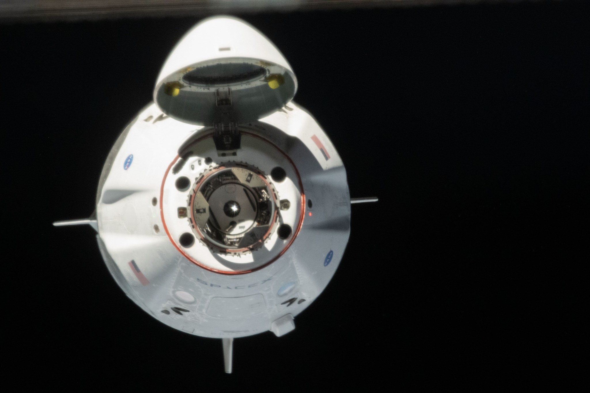  Vew from the front of the SpaceX Crew Dragon as it approaches the International Space Station for docking.