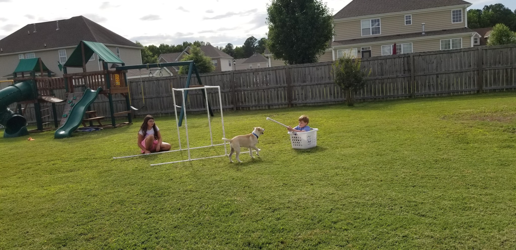 Both of Smith’s children, ages ten and five, play in the backyard with their dog, Kuiper, when not doing distance learning.