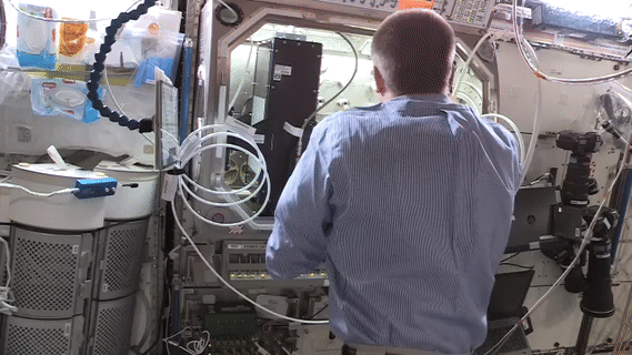 astronaut Chris Cassidy setting up for the Droplet Formation investigation