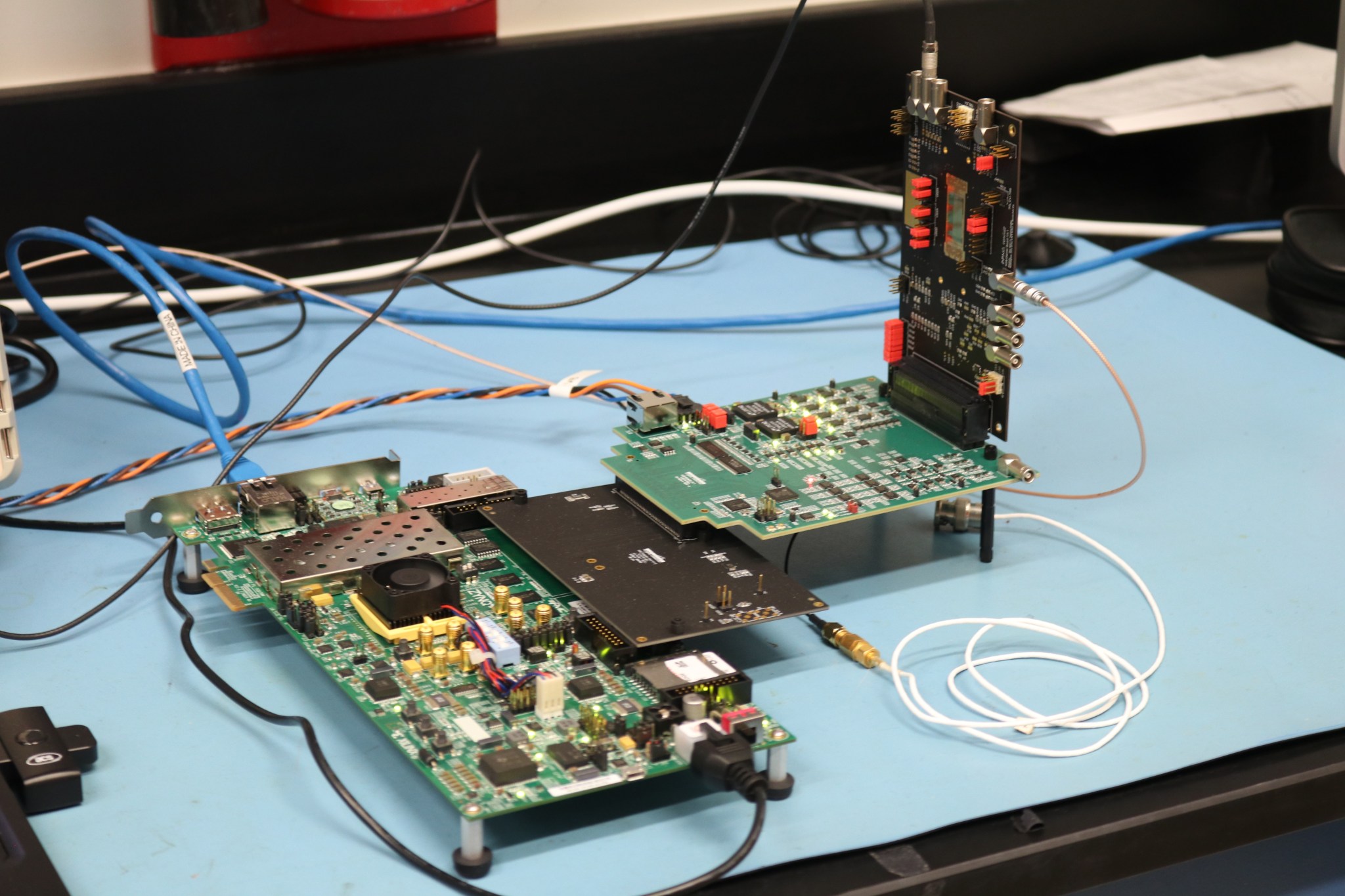 This is a breadboard of a gamma-ray detector system, there are many wires connecting different pieces of nanotechnology. 