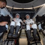 NASA astronauts Robert Behnken, left, and Douglas Hurley are seen inside the SpaceX Crew Dragon Endeavour spacecraft