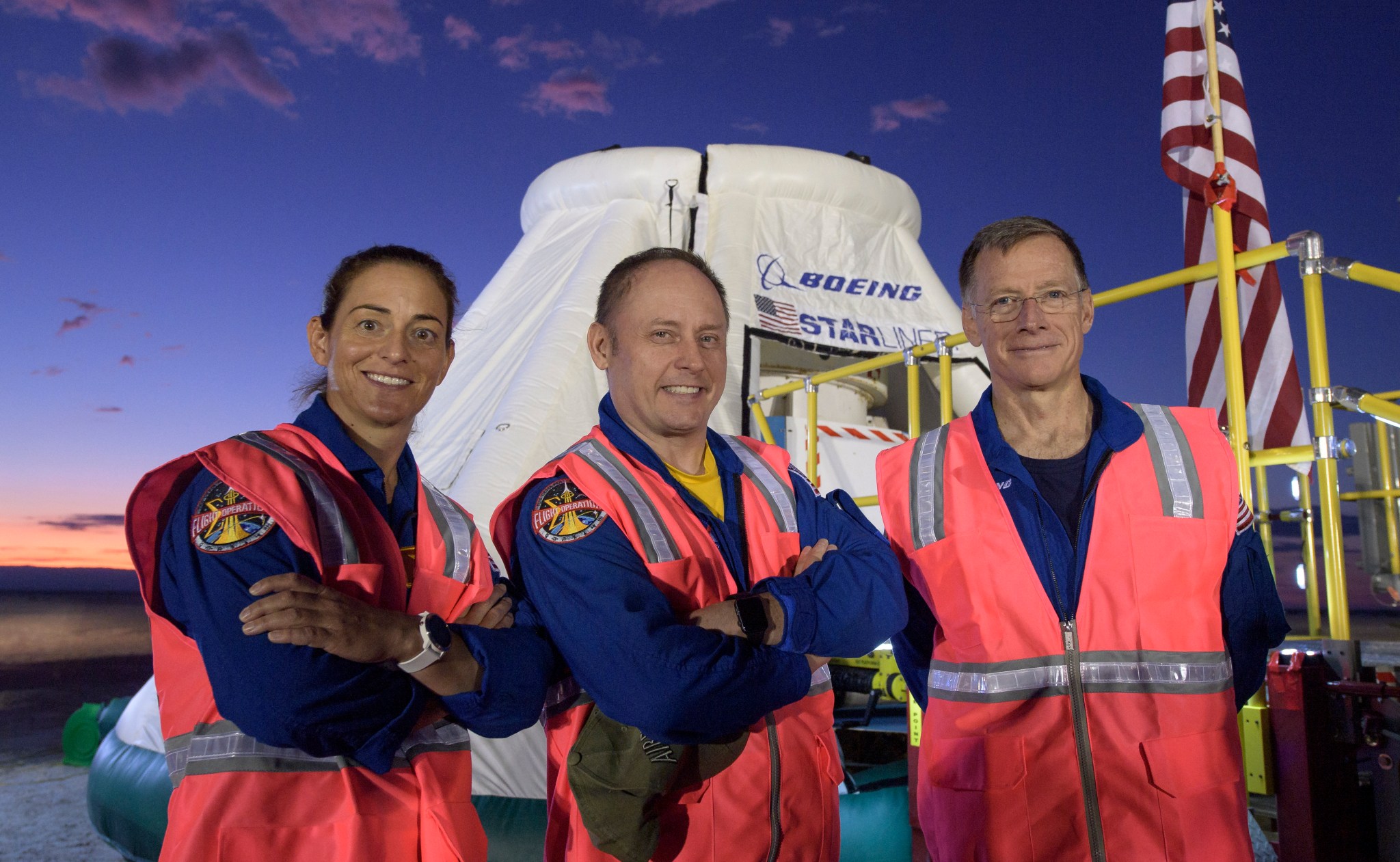 NASA astronauts Nicole Mann, left, Mike Fincke, and Boeing astronaut Chris Ferguson, right