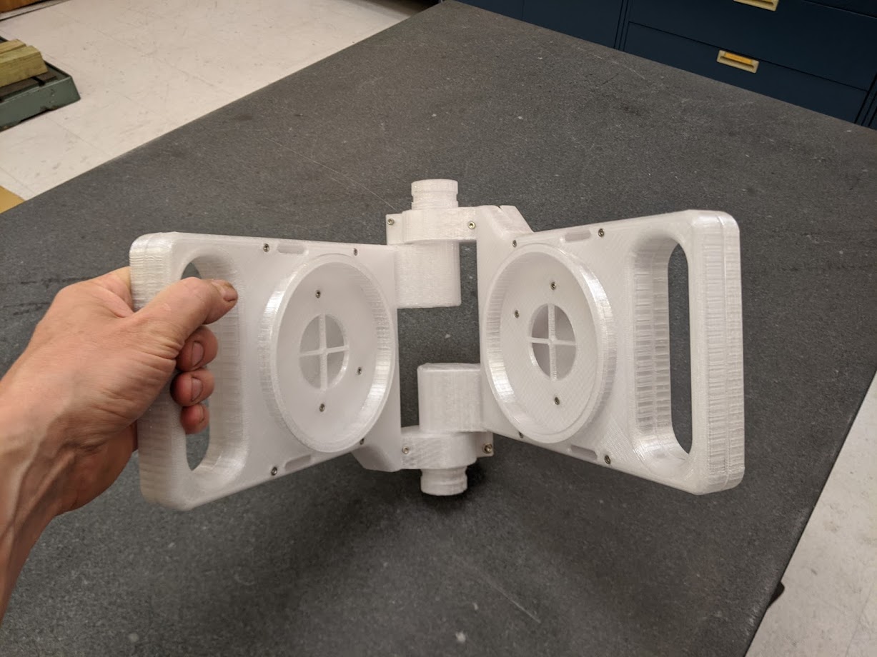 Person holding a 3D printed ventilator.