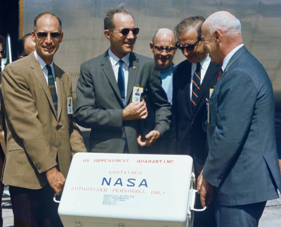 gilruth_carryging_first_box_of_moon_rocks