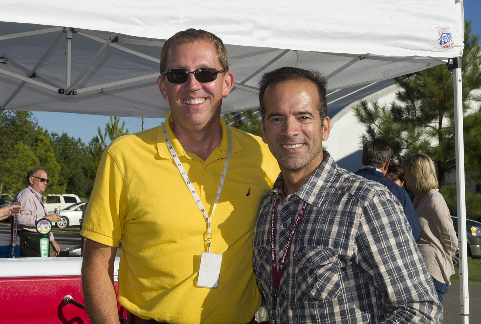 Marshall Exchange Business Manager Bill Mayo, left, and Manager Jose Matienzo during a pre-pandemic event for team members. 