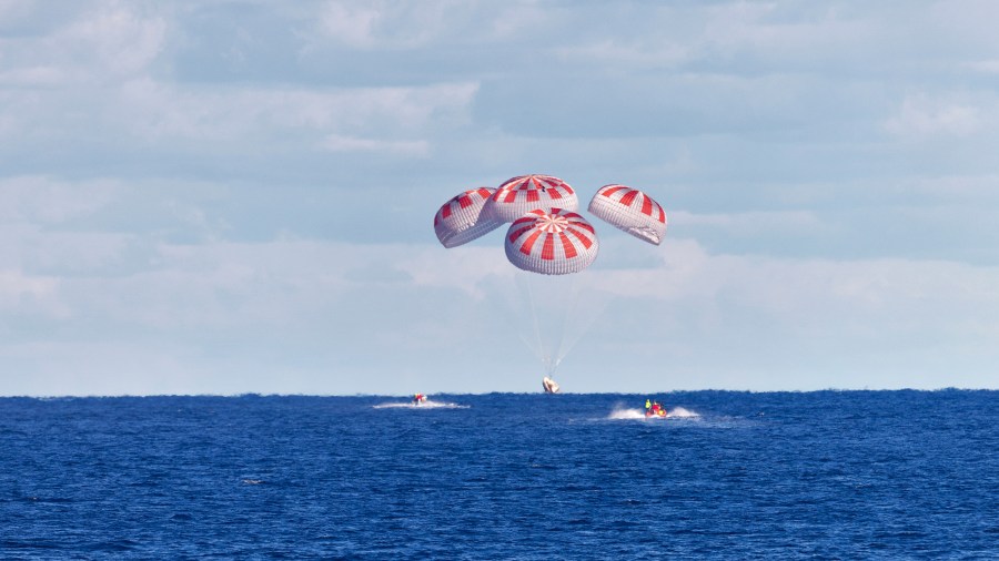 SpaceXâs first Crew Dragon parachutes to a splashdown in the Atlantic Ocean during the uncrewed Demo-1 mission on March 8, 2019.