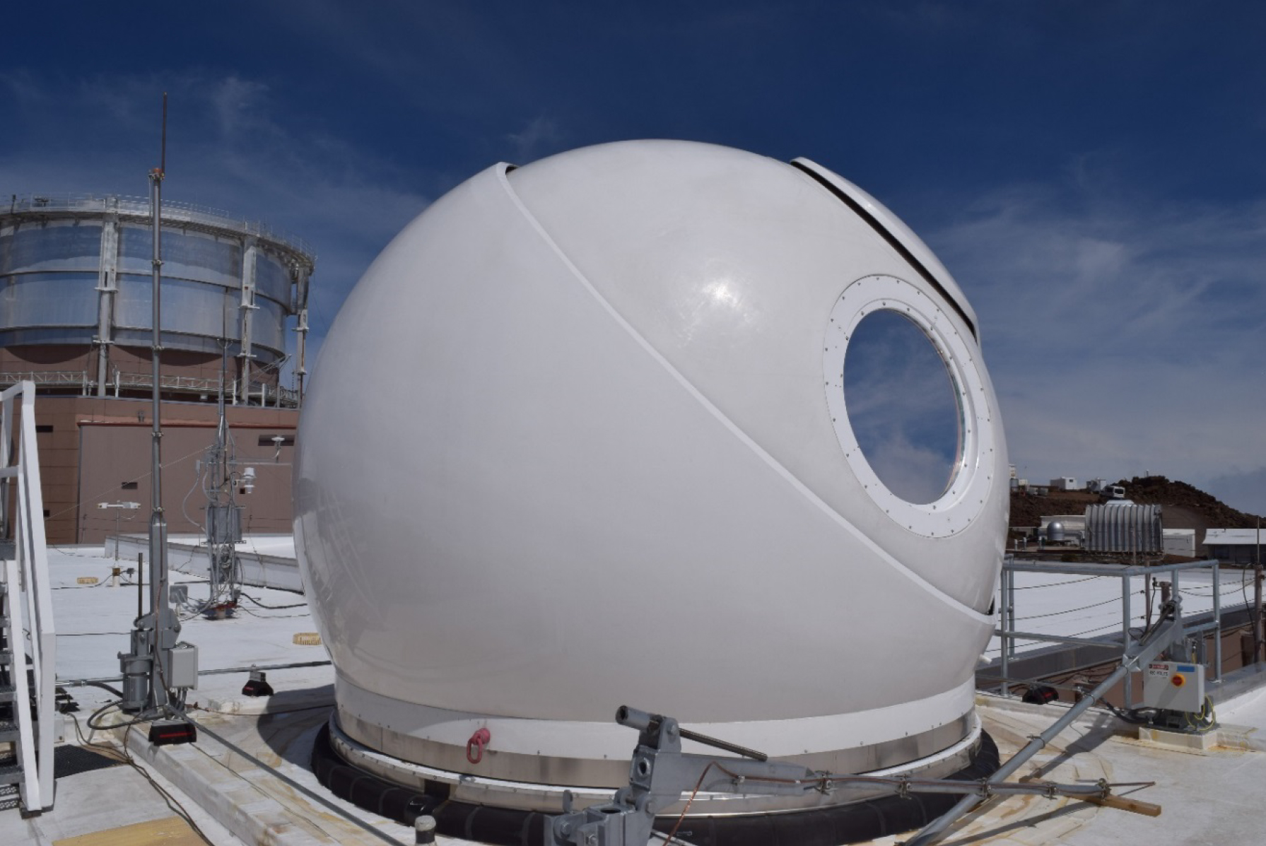 White dome with blue sky in background