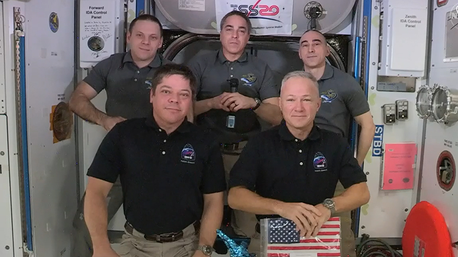 The SpaceX Crew Dragon astronauts (front row, from left) Bob Behnken and Doug Hurley joined their Expedition 63 crewmates (rear, from left) Ivan Vagner, Chris Cassidy and Anatoly Ivanishin for a crew farewell ceremony Saturday morning. Credit: NASA TV