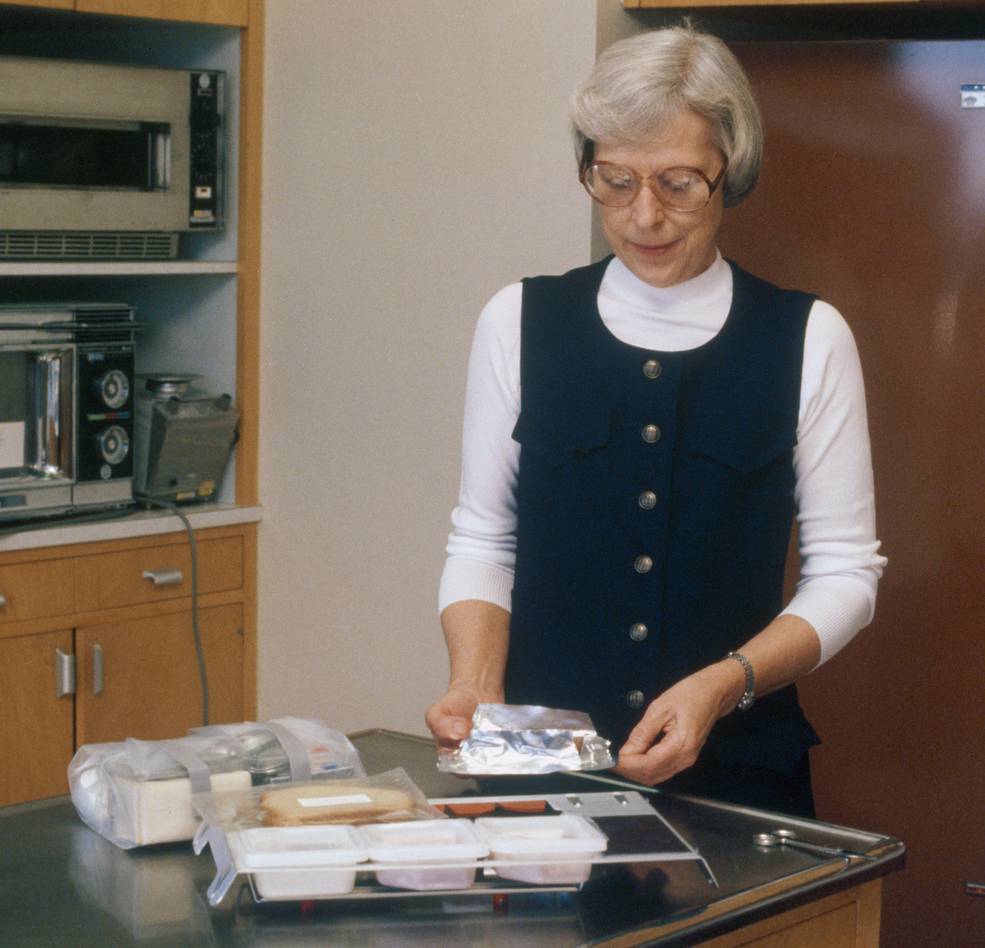 sts_1_l-8_months_rita_rapp_shuttle_food_jul_1980