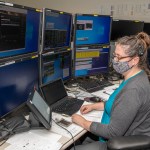 Emily Watson works Aug. 27 to continue the flow of communication between the Huntsville Operations Support Center and the ISS.