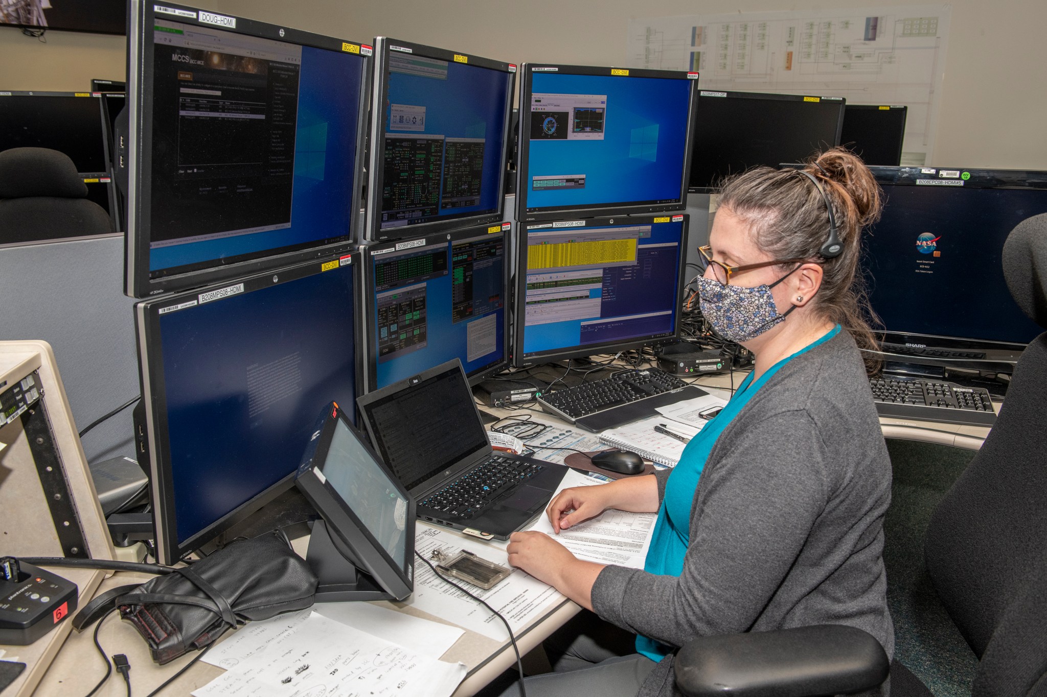 Emily Watson works Aug. 27 to continue the flow of communication between the Huntsville Operations Support Center and the ISS.