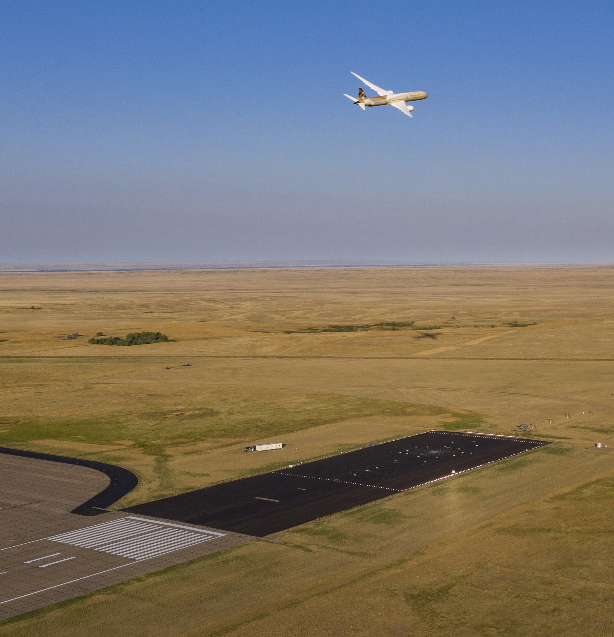 787-10 Dreamliner makes a low pass over.