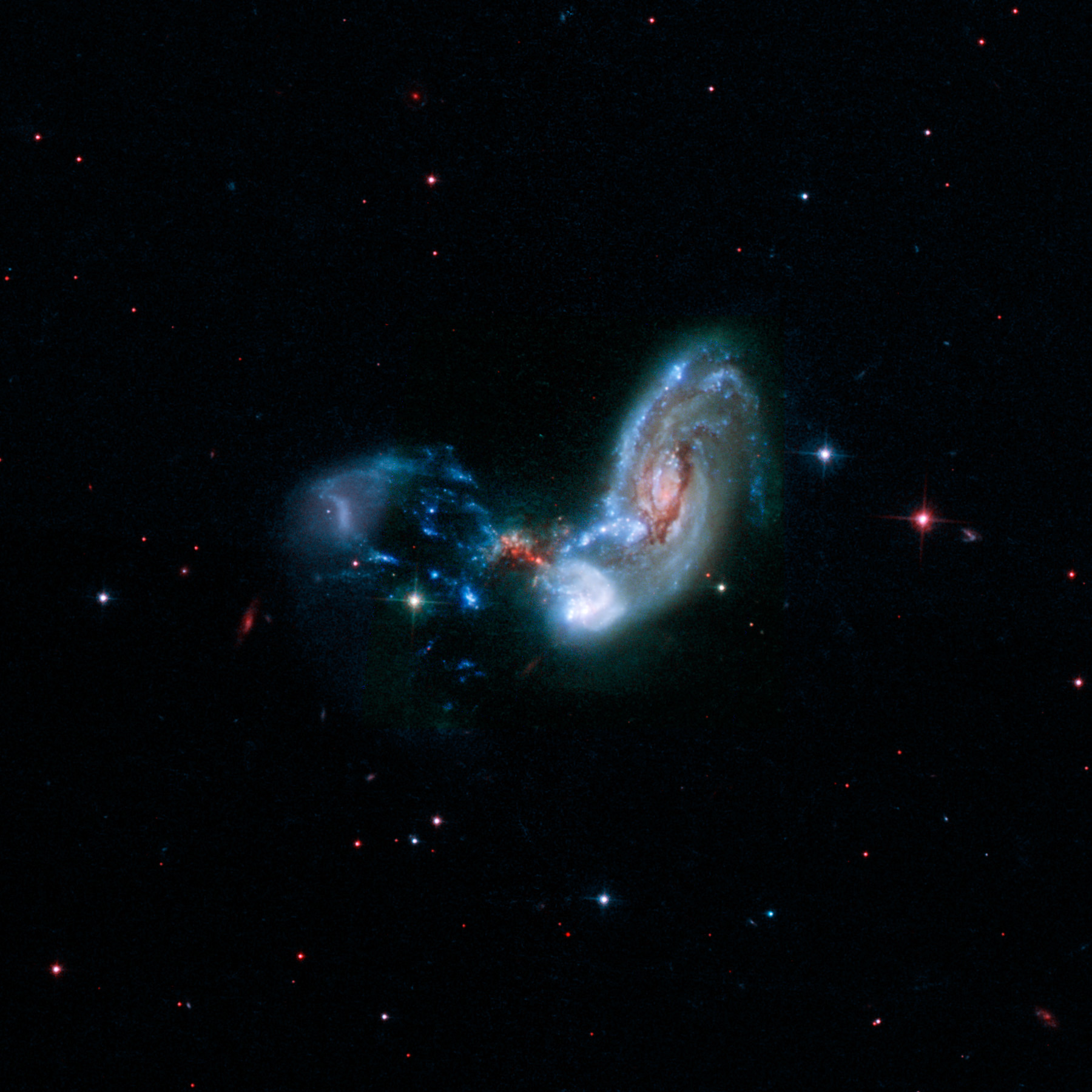 The image above combines near-infrared, visible, and far-ultraviolet observations from the Hubble Space Telescope.