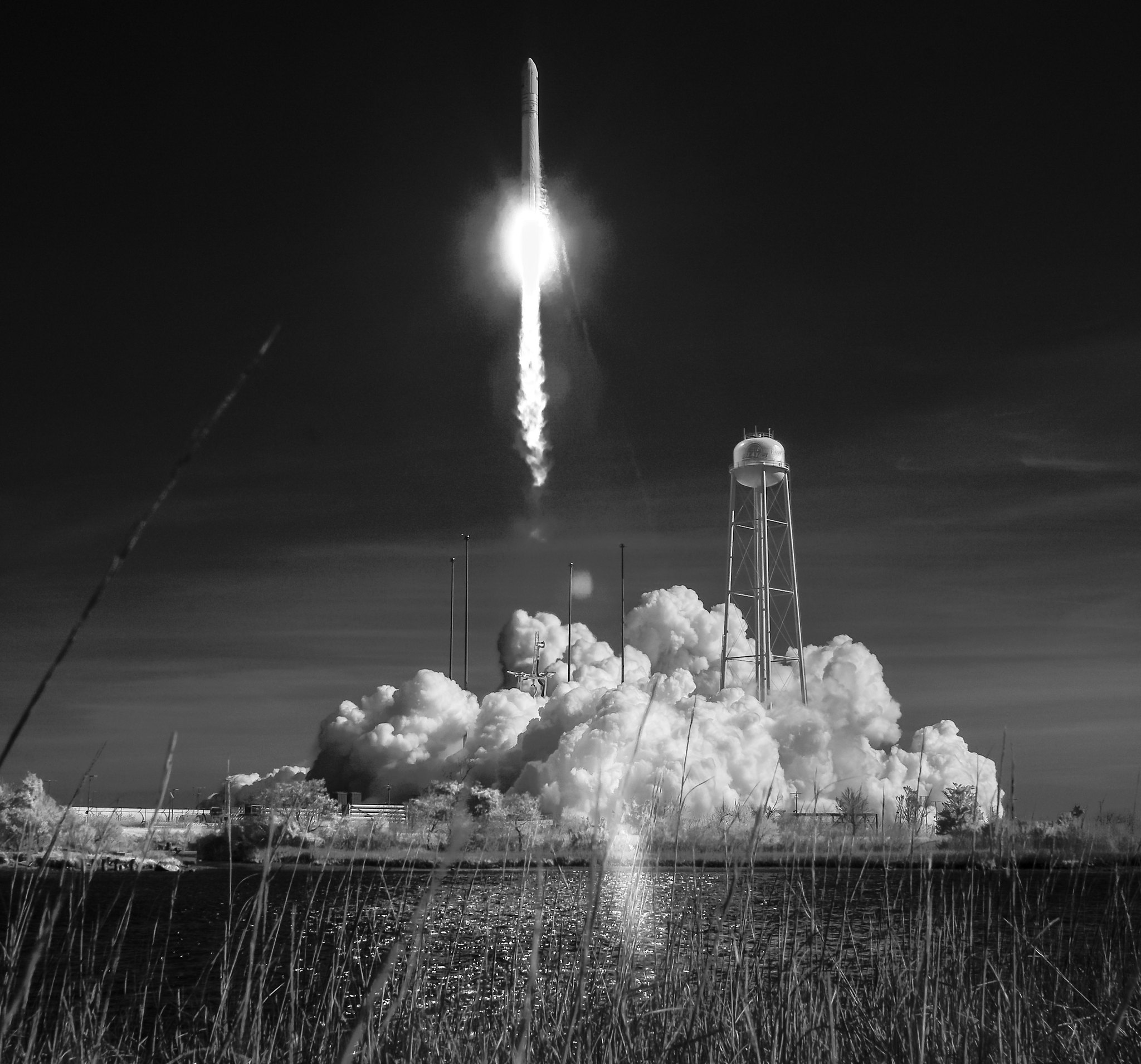 The Northrop Grumman Antares rocket, with Cygnus resupply spacecraft onboard, is seen in this black and white infrared photo