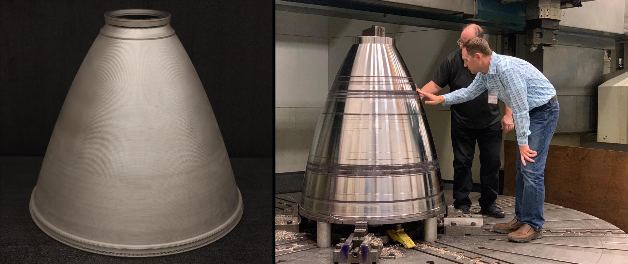 3D printed rocket engine nozzles and two men looking at them
