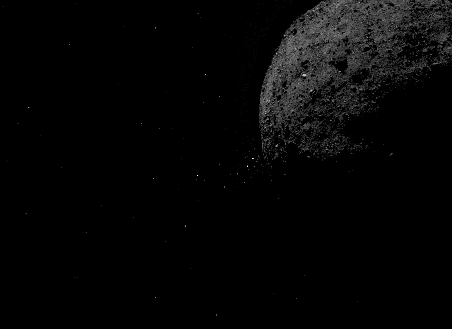 Asteroid Bennu ejecting rock particles