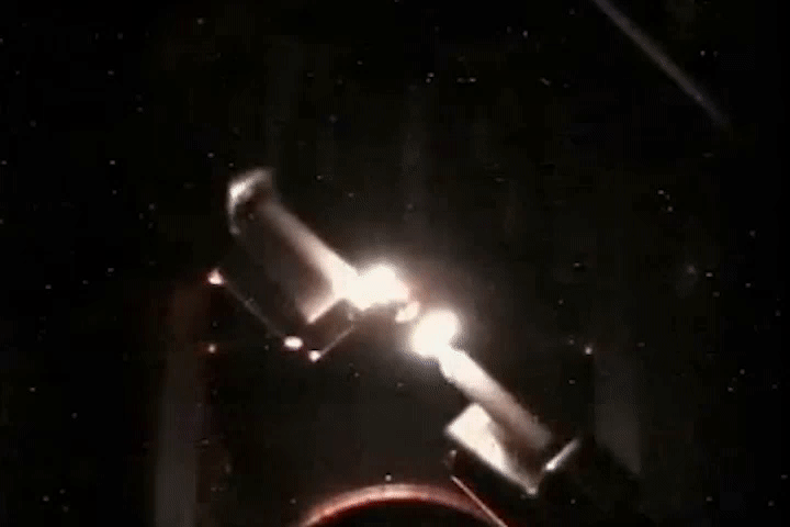 animated gif of a burning drop of fuel in space