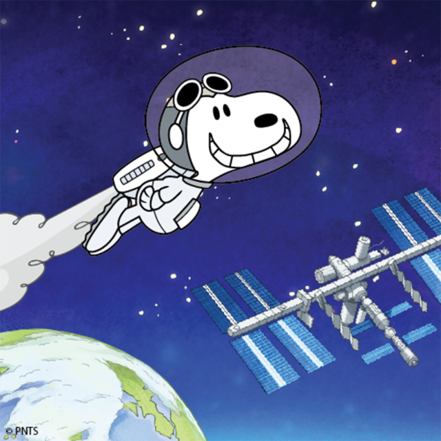Cartoon Snoopy in space and the International Space Station
