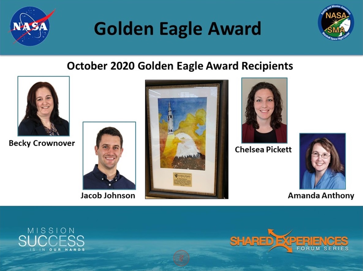 Four Marshall team members are recognized with the Golden Eagle Award for their roles in assuring a safe test of components.