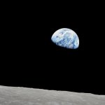 The Earth rises above the lunar horizon in this telephoto view taken from the Apollo 8 spacecraft. Season three of NASA's "On a Mission" podcast looks at Earth from all angles, including from the perspectives of the pioneering astronauts.