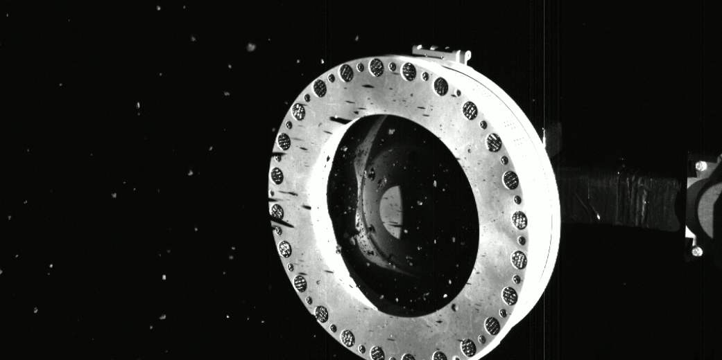 three images shows that the sampler head on NASA’s OSIRIS-REx spacecraft is full of rocks