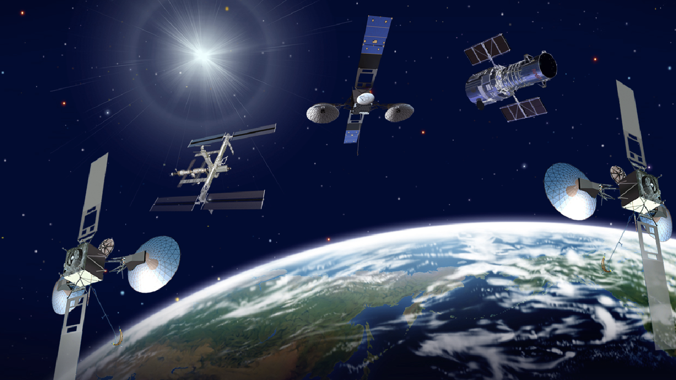 An artist’s rendering of Tracking and Data Relay Satellites alongside two of the flagship missions they support, the Internation