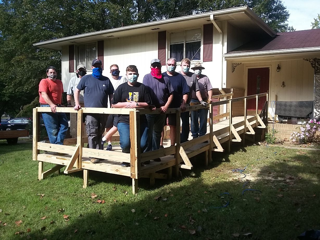Members of Marshall’s workforce and the Office of Center Operations complete a wheelchair ramp.