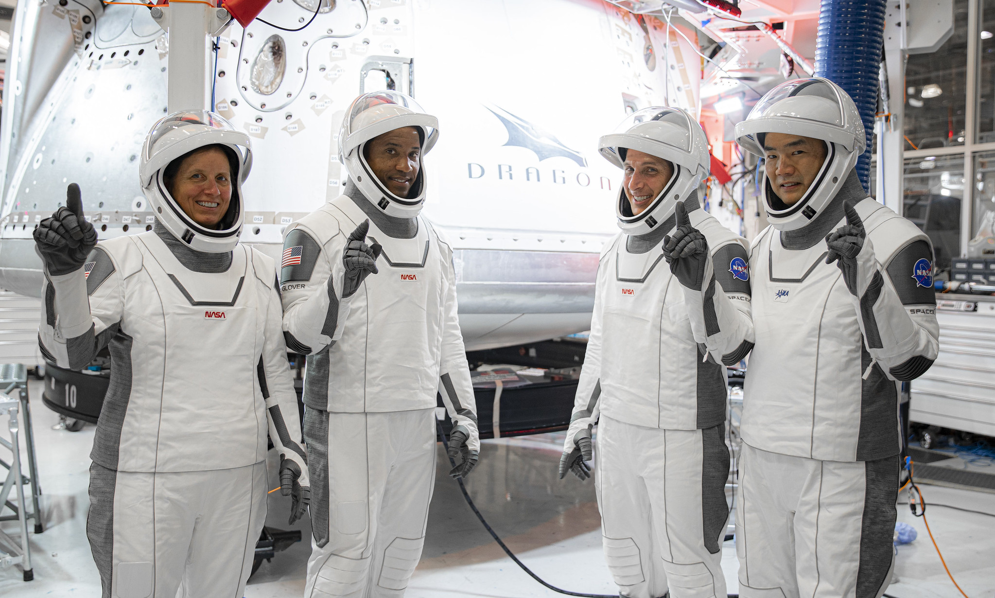 From left: Shannon Walker, Victor Glover, Michael Hopkins, all NASA astronauts, and Soichi Noguchi, JAXA astronaut