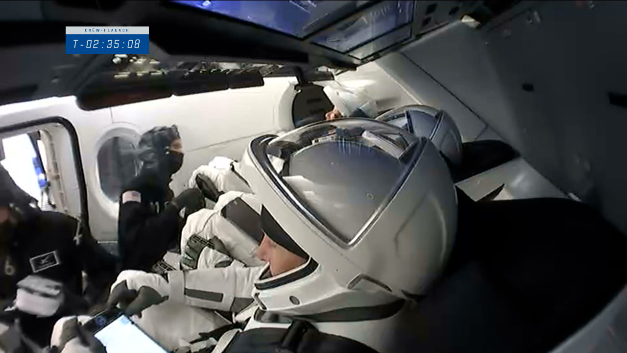 Crew-1 strap in