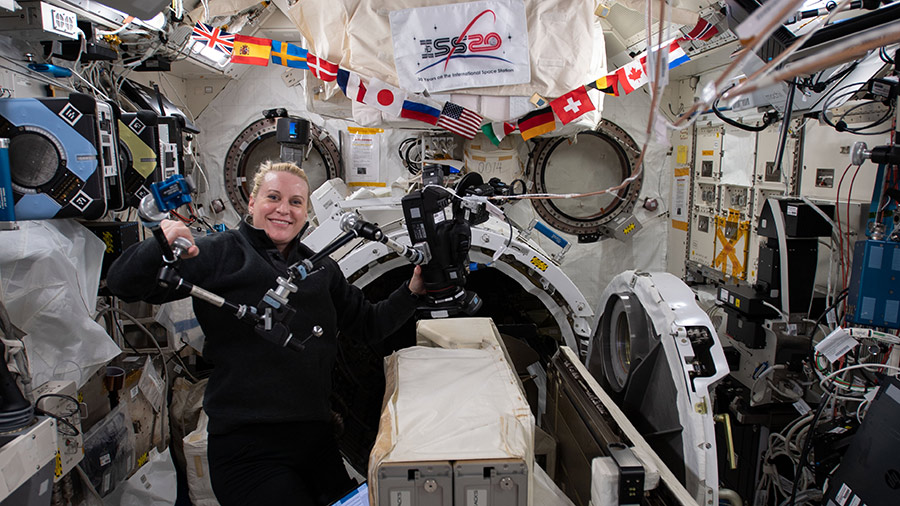 Expedition 64 Flight Engineer Rubins works in Japan's Kibo laboratory module to set up a small satellite deployer.