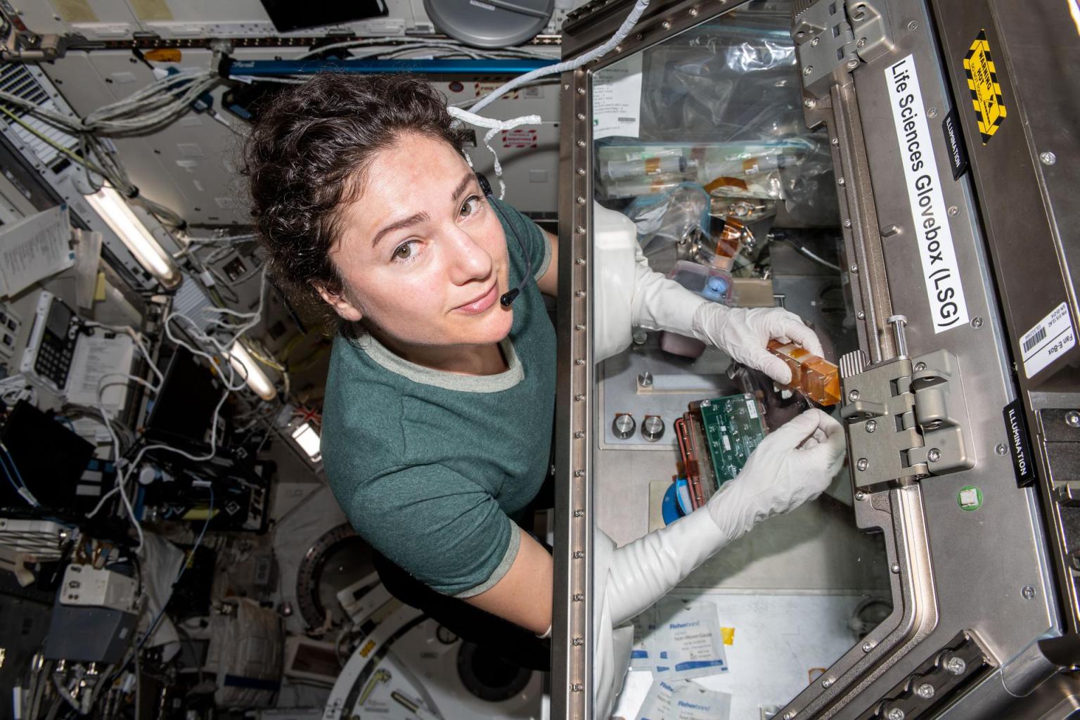 NASA astronaut and Expedition 62 Flight Engineer Jessica Meir conducts cardiac research in the Life Sciences Glovebox