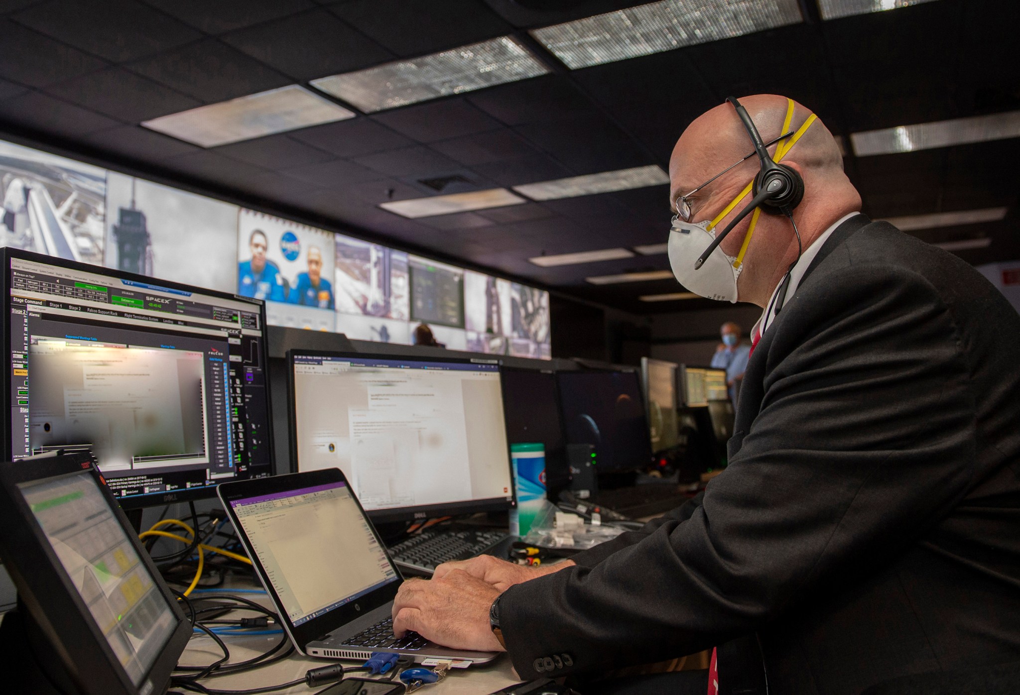Paul Crawford, chief Mission Safety manager for NASA’s Commercial Crew Program, monitors NASA’s SpaceX Demo-2 mission countdown.