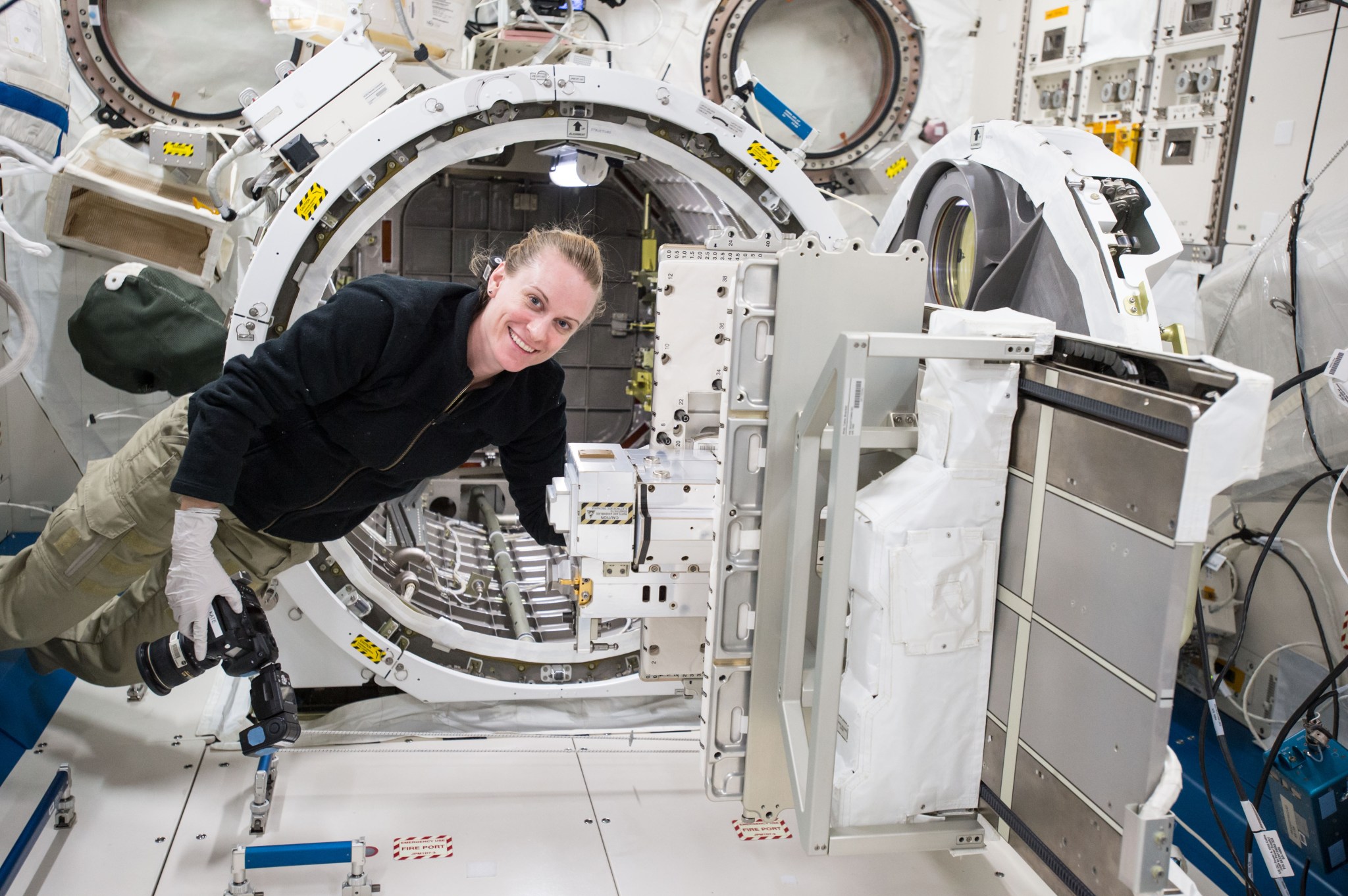 Astronaut adding the Bishop Airlock Module to ISS.