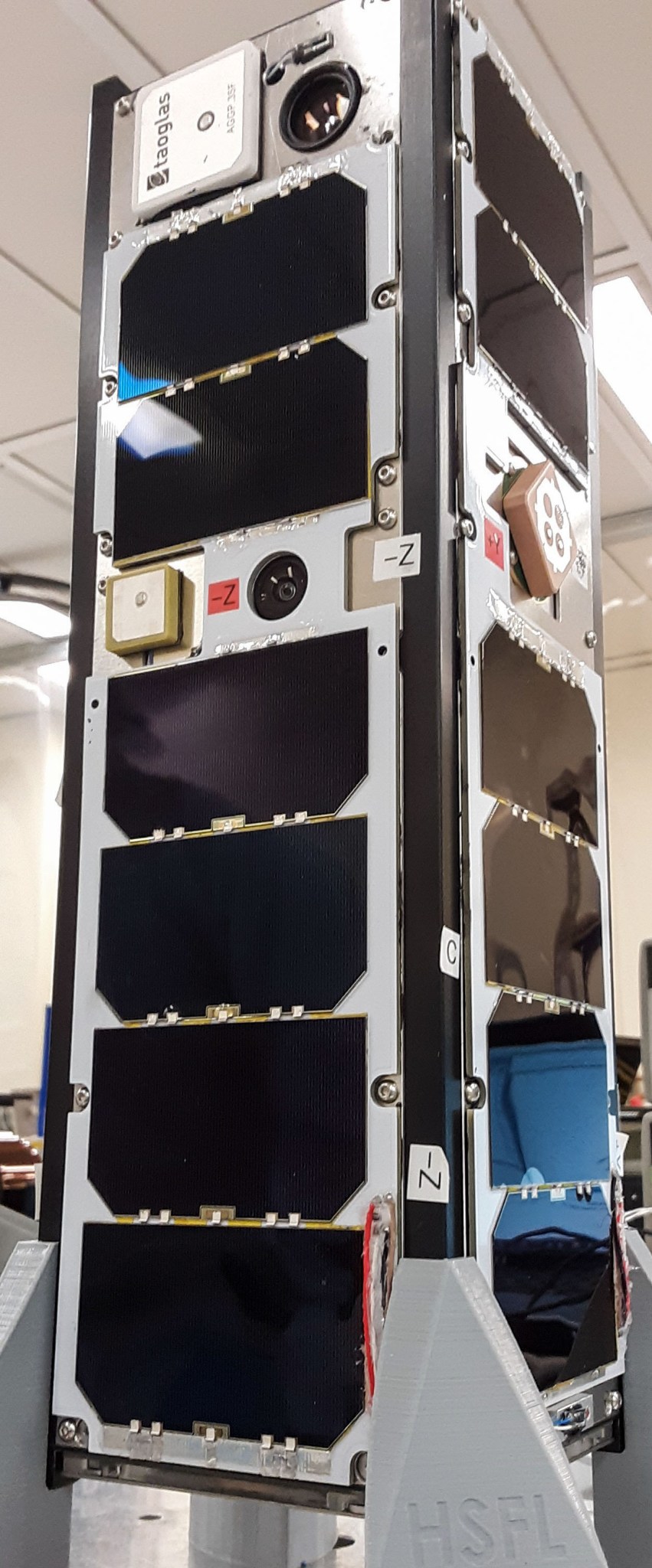 A preflight view of Neutron-1 3U CubeSat fully assembled prior to vibration testing.