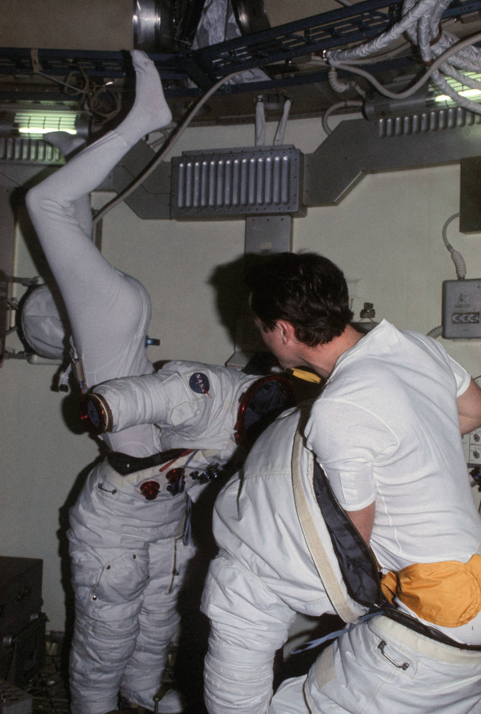 skylab_4_suiting_up_for_an_eva