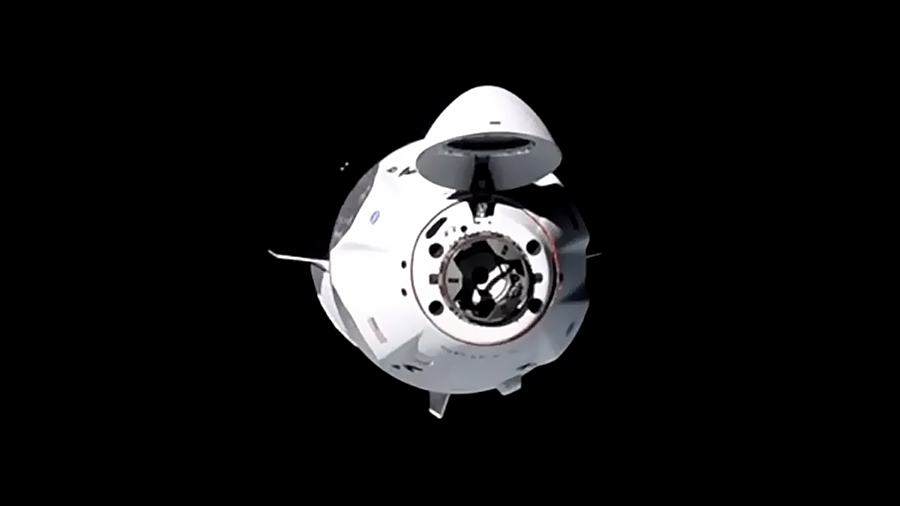 The SpaceX Crew Dragon spacecraft carrying four Commercial Crew astronauts is pictured approaching the International Space Station for a docking.
