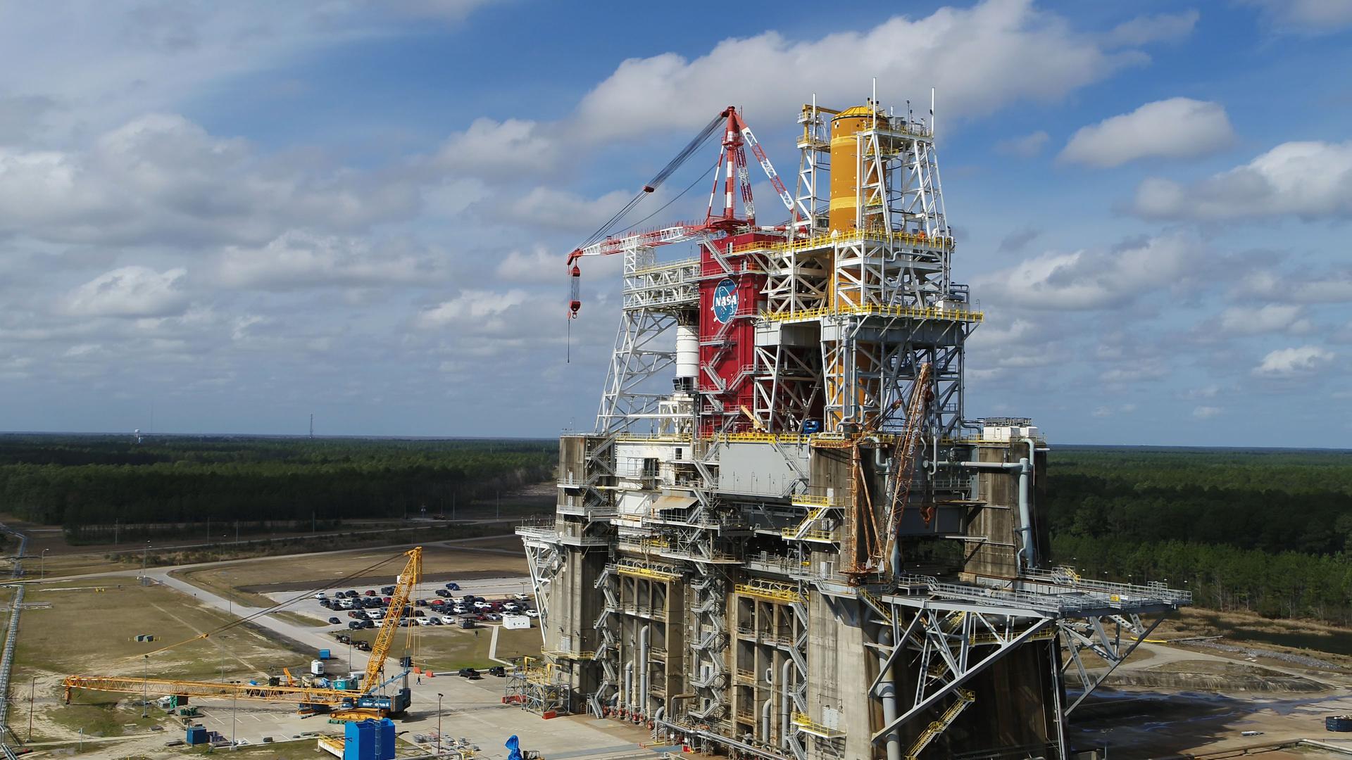 The Space Launch System core stage is installed in the B-2 Test Stand at NASA’s Stennis Space Center for the Green Run test