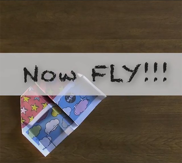 Colorful paper airplane and the words "Now fly"