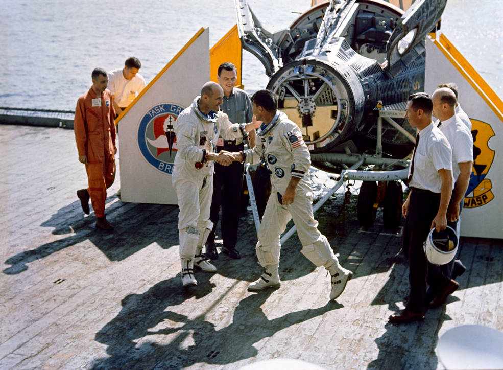 gemini_6_recovery_schirra_stafford_w_capsule_on_uss_wasp