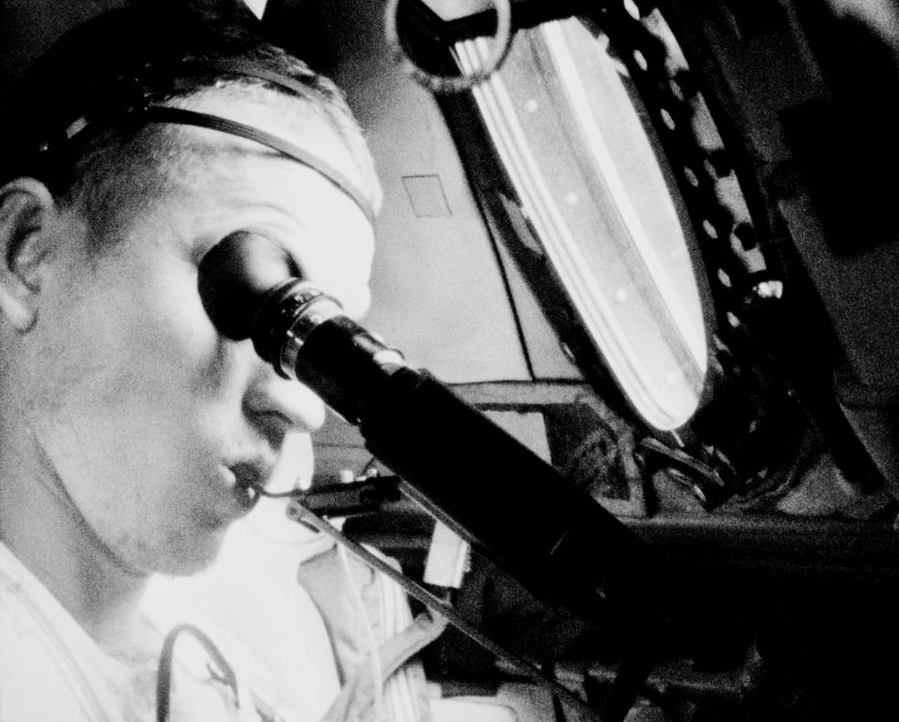gemini_7_borman_aboard_7_doing_visual_acuity_and_taking_temp