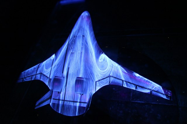 Fluorescent oil on a model of a futuristic hybrid wing body during tests in the14 by-22-Foot Subsonic Wind Tunnel.