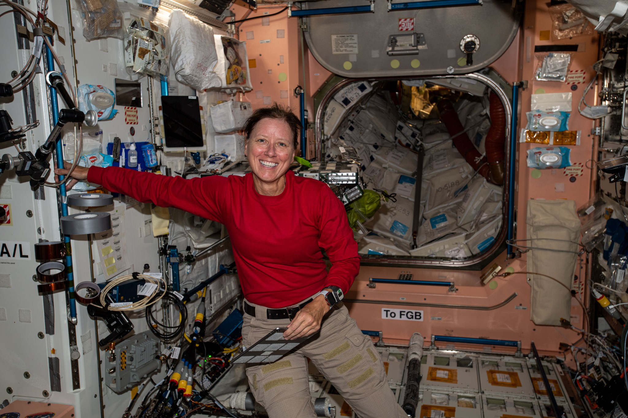 Expedition 64 Flight Engineer Shannon Walker smiles for a portrait