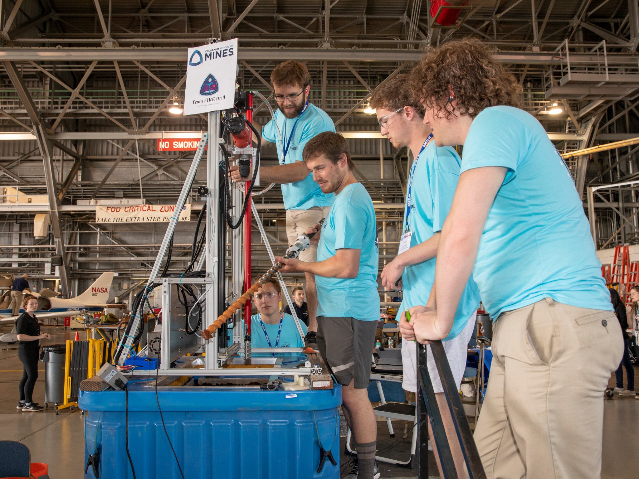 students work on drill during competition