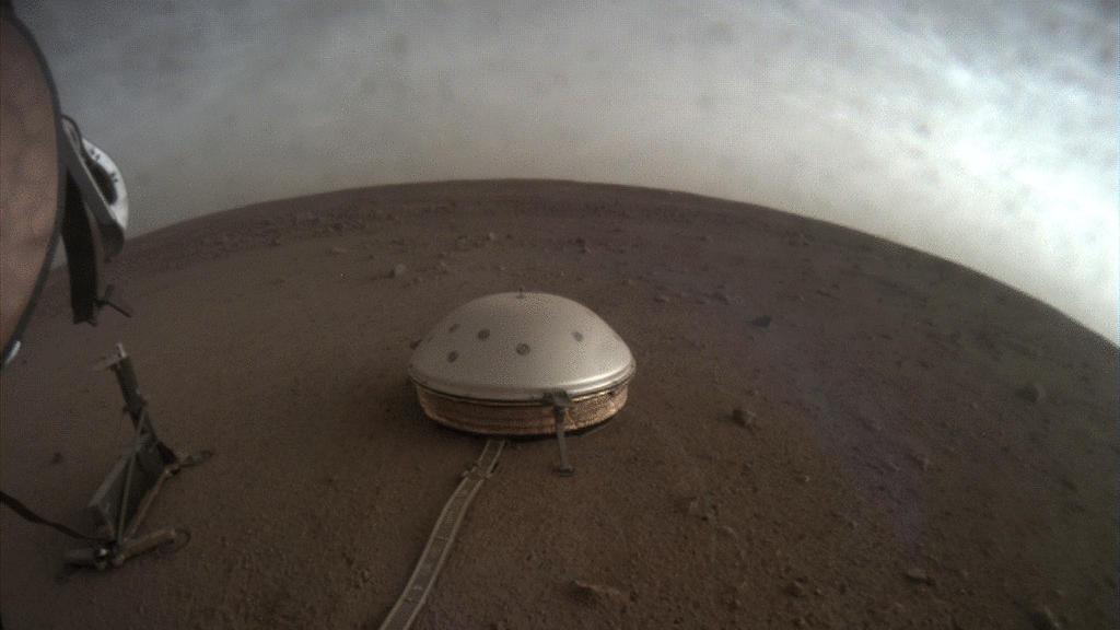 NASA's InSight used its Instrument Context Camera (ICC) beneath the lander's deck to image these drifting clouds at sunset.